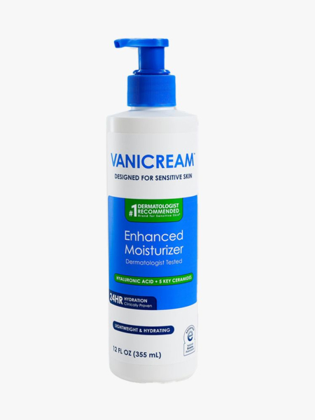 White and blue pump bottle of Vanicream Enhanced Moisturizer with blue pump on light gray background