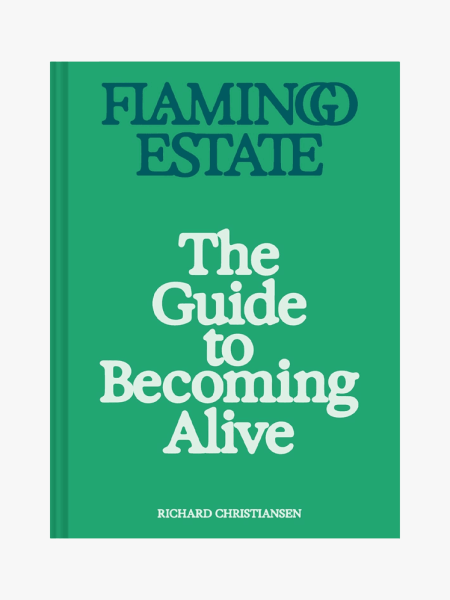 Flamingo Estate: The Guide to Becoming Alive in branded component on a light gray background